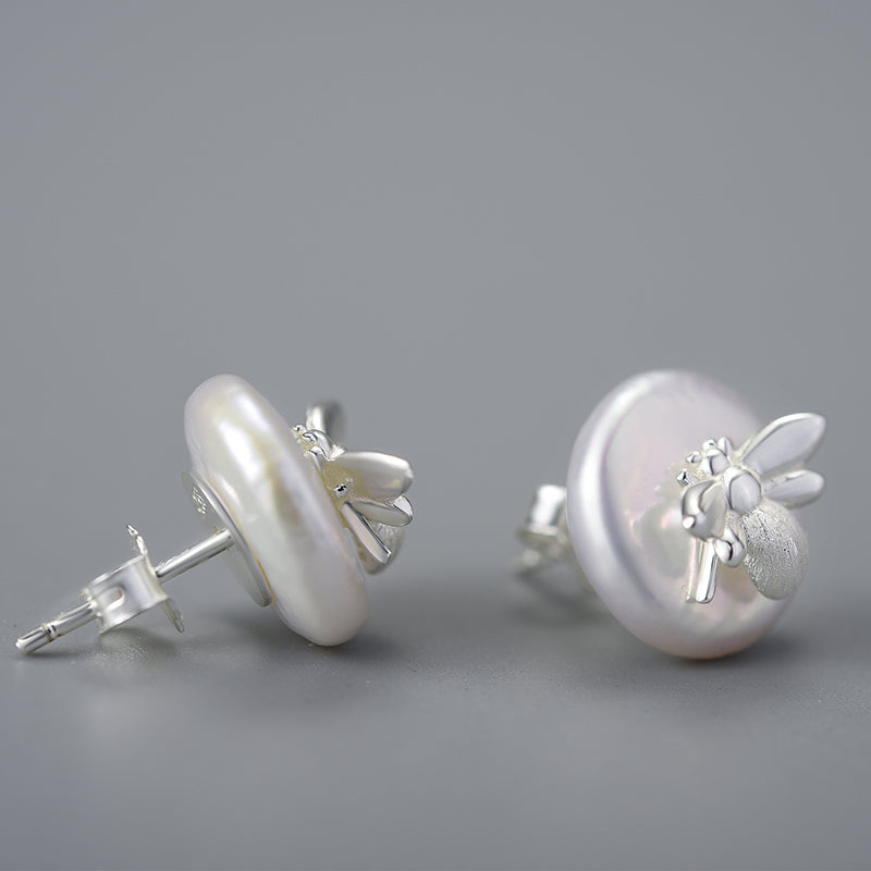 pendientes de mariposa con perla blanca