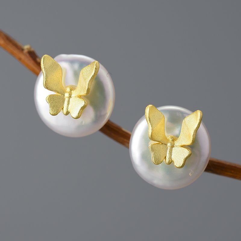 pendientes de mariposa con perla blanca