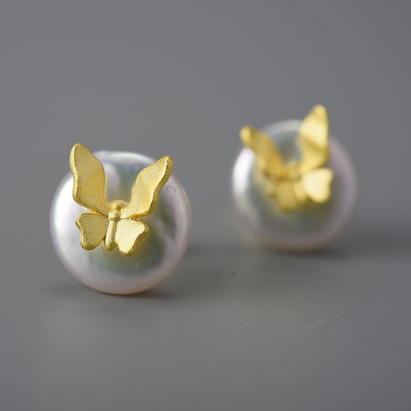 pendientes de mariposa con perla blanca