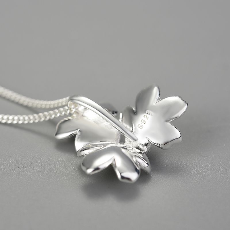 three flowers of the soul necklace in sterling silver and 18k gold for women