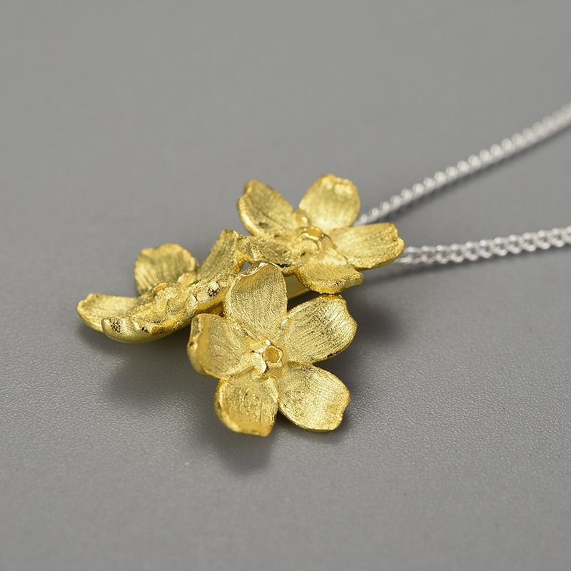 three flowers of the soul necklace in sterling silver and 18k gold for women