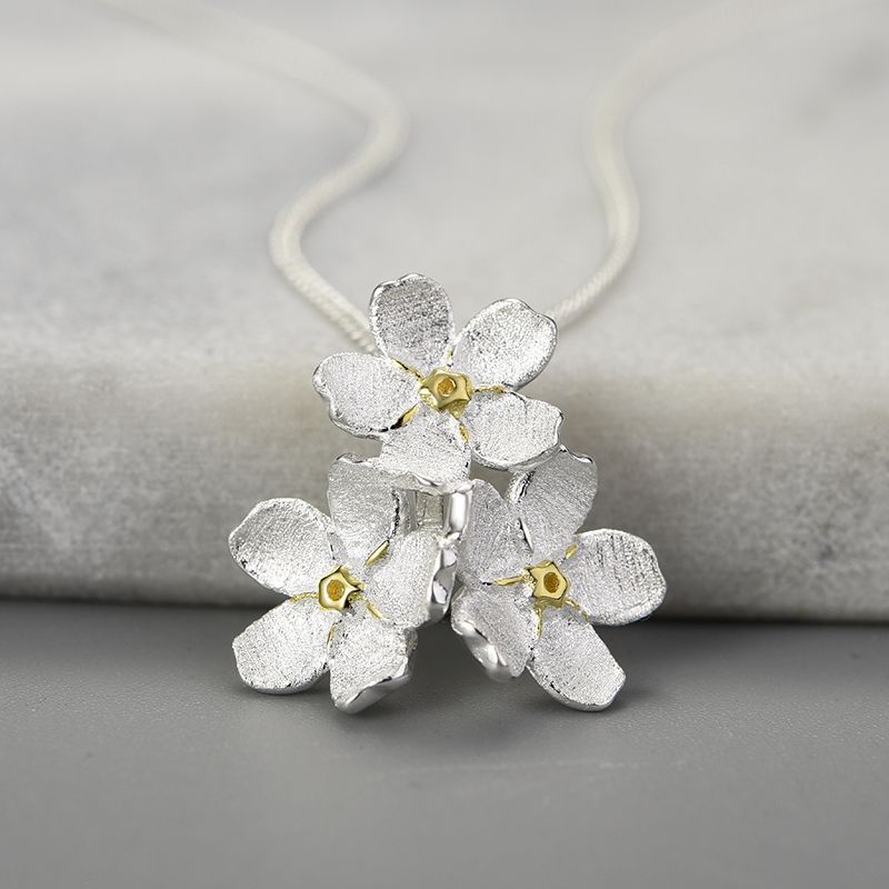 three flowers of the soul necklace in sterling silver and 18k gold for women