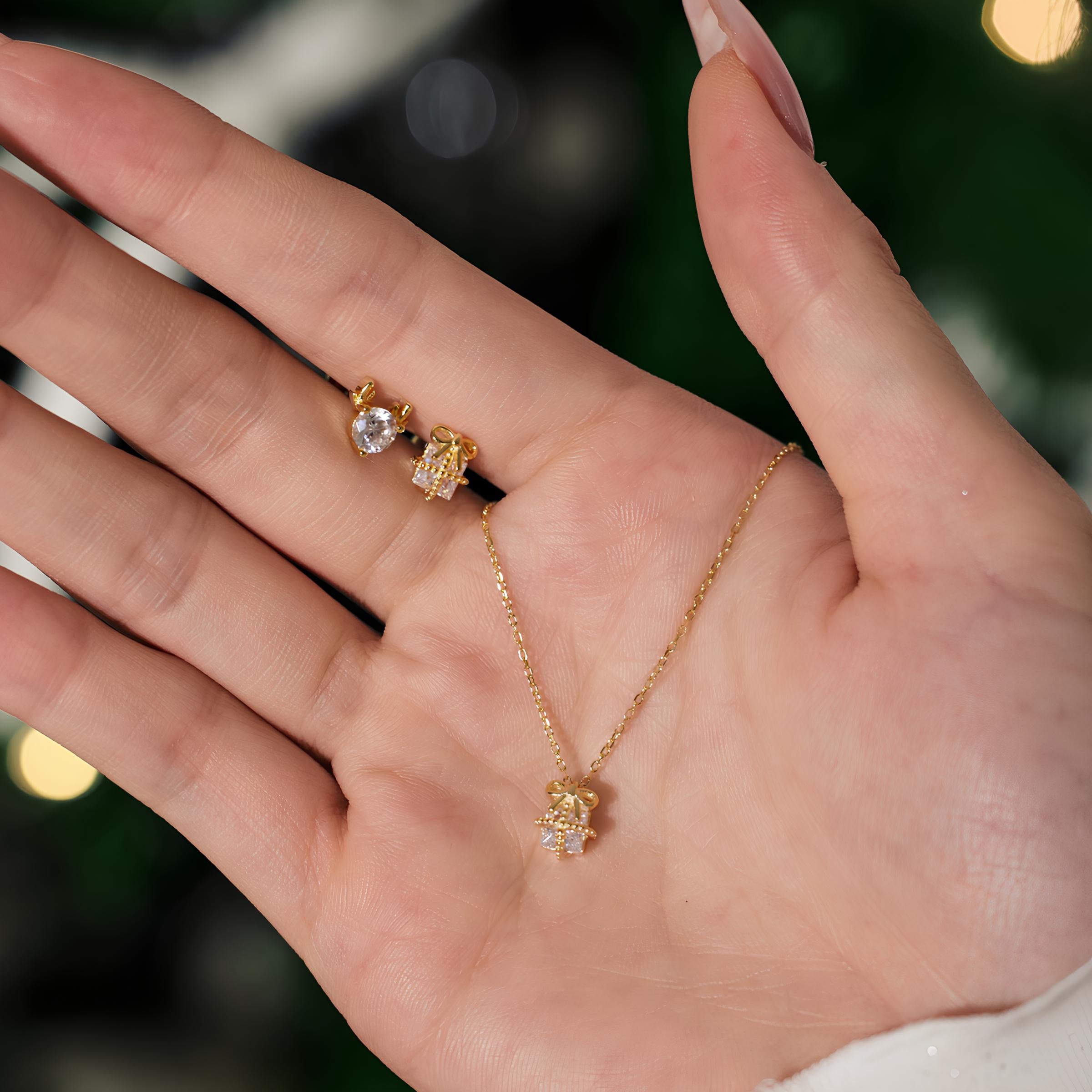 Pendientes Regalo y reno con piedra blanca