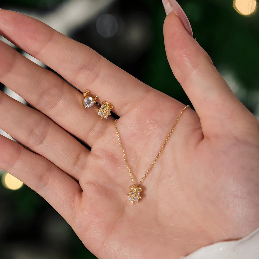 Pendientes Regalo y reno con piedra blanca